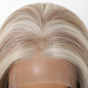 Blonde wig on a mannequin head with a clear background
