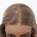 Close-up of a wig with a lace front on a white background