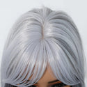 Close-up of a silver wig hairline on a white background