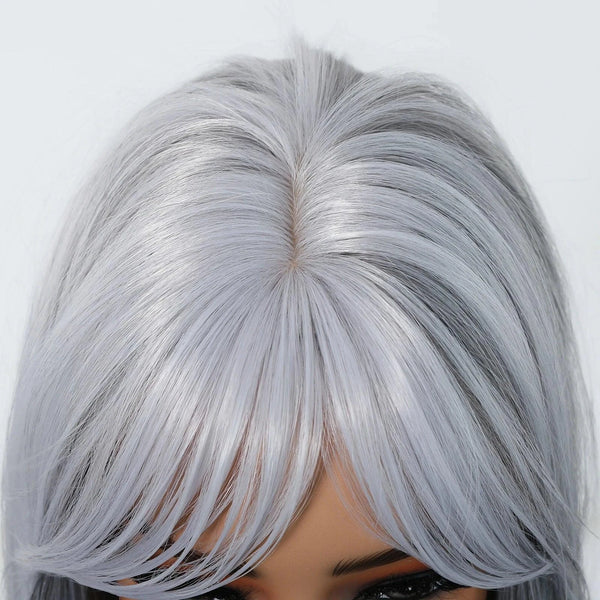 Close-up of a silver wig hairline on a white background