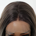 Close-up of a wig with a lace front on a white background