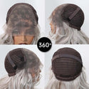 Interior view of silver grey wig cap showing adjustable straps and breathable mesh