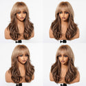 Model wearing honey brown bang wig with face-framing blonde highlights and soft waves
