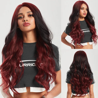 Model wearing long red and black ombre wig with soft waves – front view