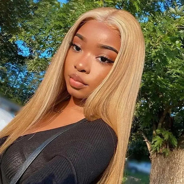 Woman wearing Long Blonde Human Hair Wigs with greenery in the background