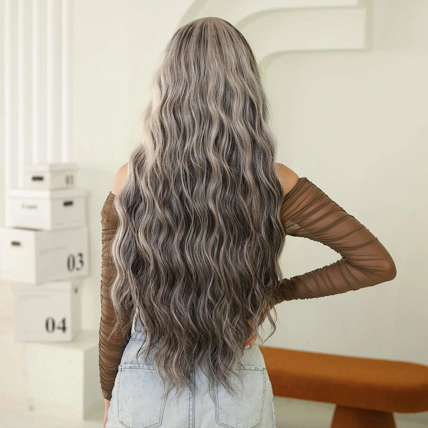 Back view of heat-resistant silver ombré wig with natural wave texture

