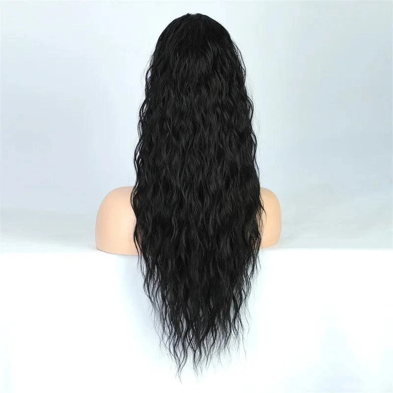 Black wavy hair ponytail extension on a mannequin head against a white background