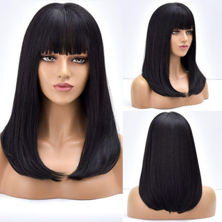 Black wig with fringe on mannequin – front view