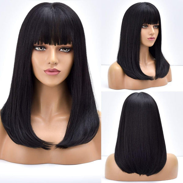 Black wig with fringe on mannequin – front view