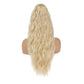 Blonde curly ponytail extension on a mannequin head against a white background