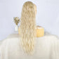 Blonde ponytail extension on a mannequin head with a plain background