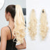 Blonde ponytail extensions on a white background
