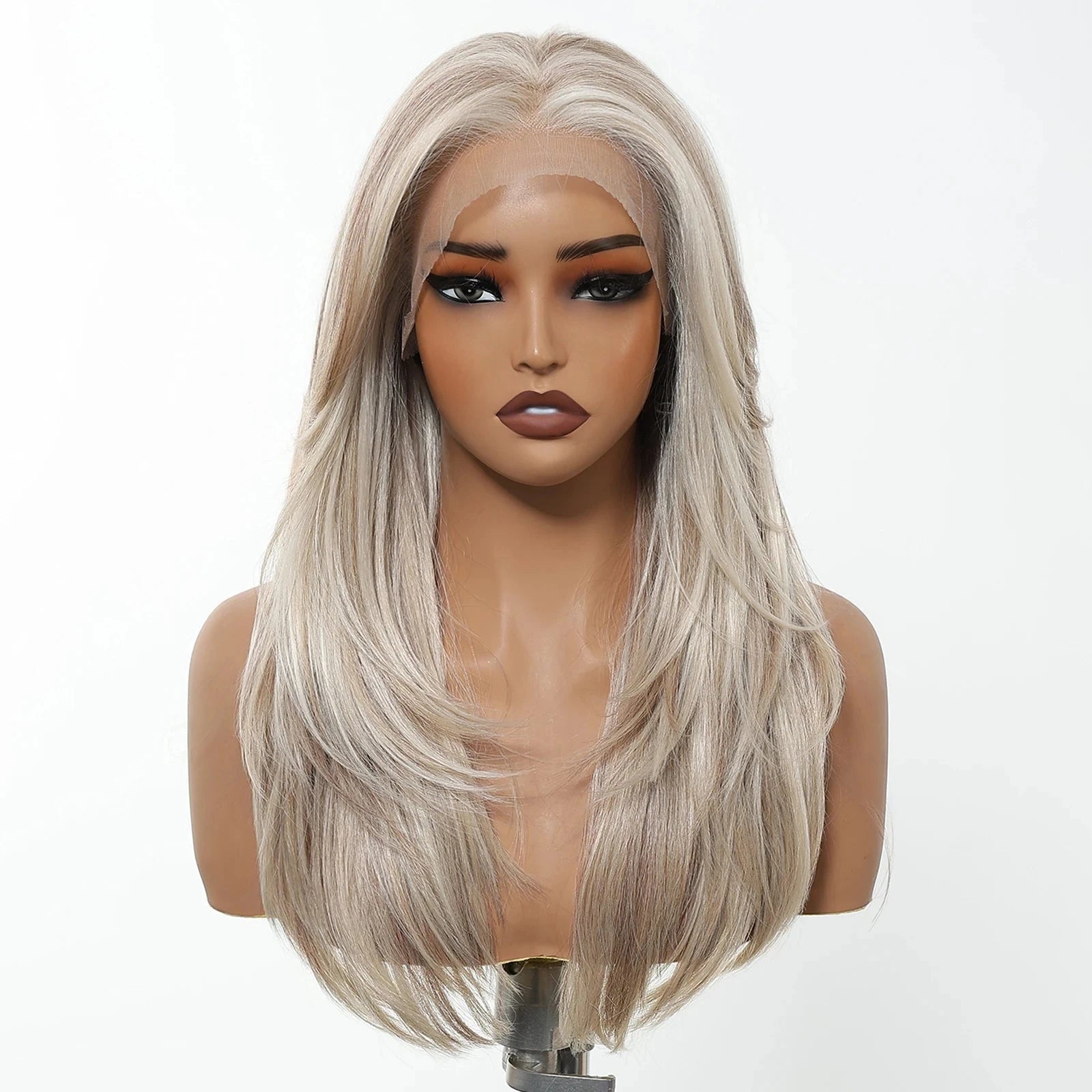 Blonde wig on a mannequin head against a white background