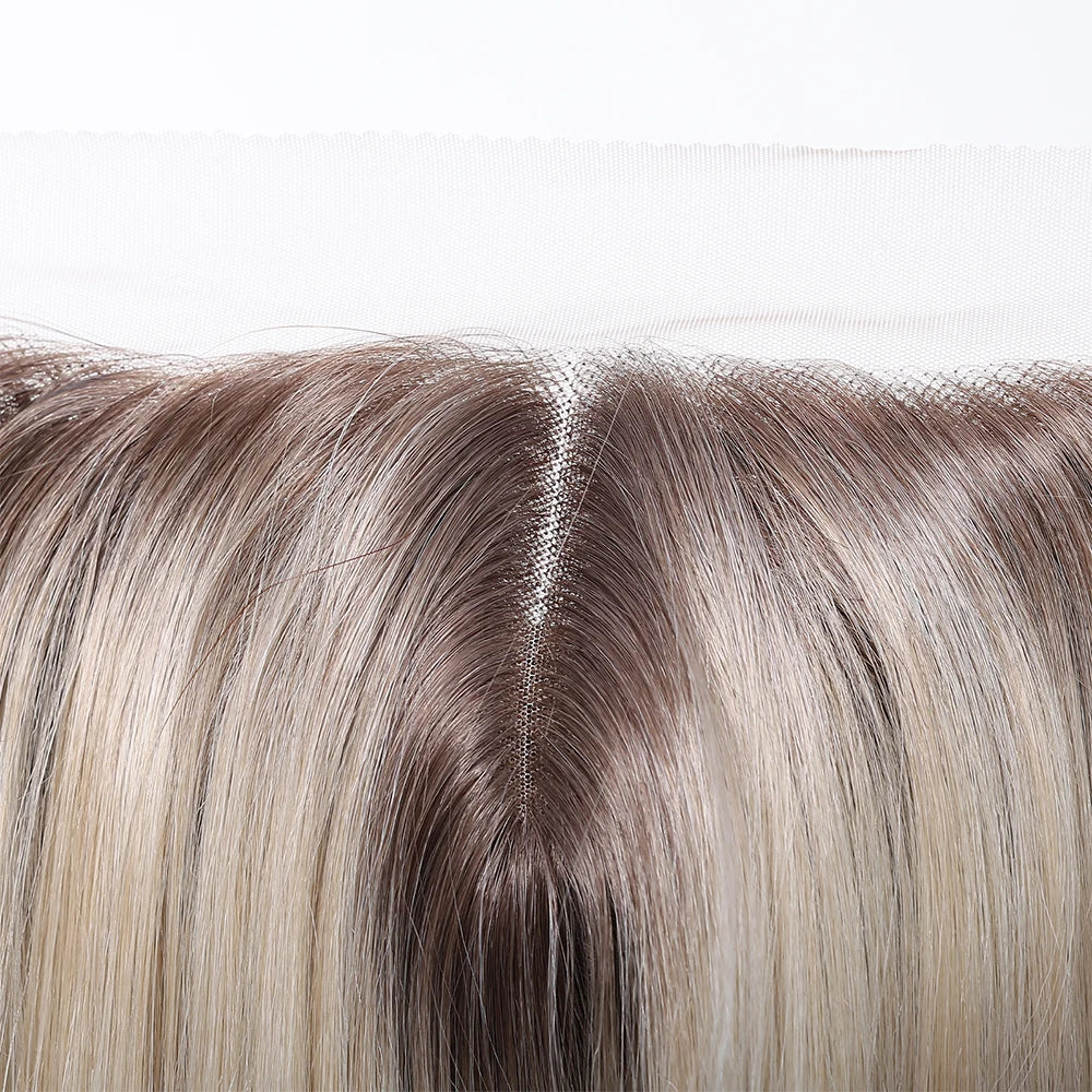 Close-up of a hairline lace front wig with brown and blonde color gradient on a white background