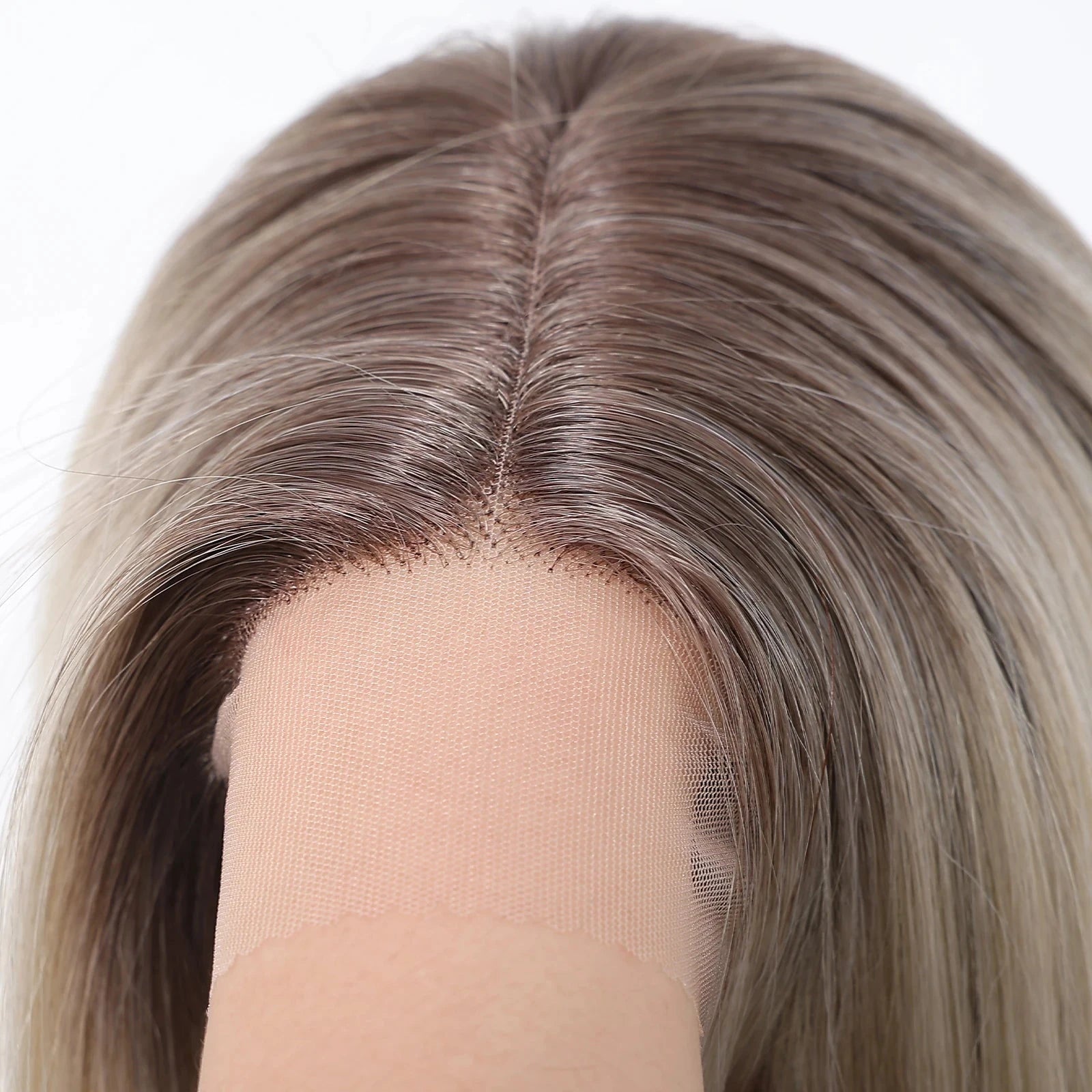 Close-up of a wig with a lace front on a white background