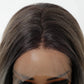 Close-up of a wig with a lace front on a white background