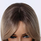 Close-up of curtain bangs on blonde bob wig – soft layered fringe with natural middle part and face-framing highlights
