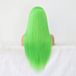 Green wig on a mannequin head against a white background
