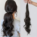 Hair extension shown on a person with a plain background