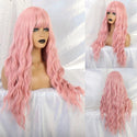 Long pink wavy wig on a mannequin head with close-up details against a white background