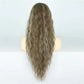 Long wavy hair curly ponytail extension on a mannequin head against a white background