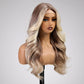 Mannequin head with a blonde and brown ombre wig on a gray background