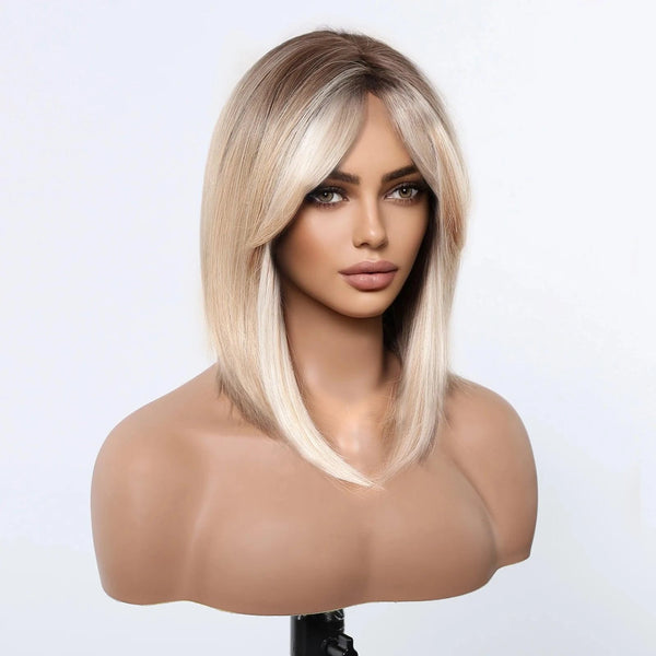 Mannequin head with a blonde wig on a white background