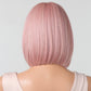 Mannequin head with pink straight hair on a light gray background