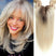 Front view of 14-inch Remy human hair blonde topper with ombre roots on a model