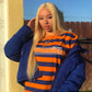 Model wearing blonde full lace wig with baby hairs