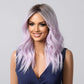 Model wearing long vibrant purple wig for drag or glam looks