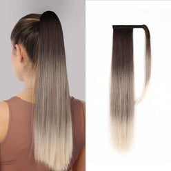 Ombre hair extension worn by a person and on a white background