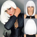 Person wearing a white wig with a gray background