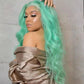 Person with a Green Wig styled in waves, wearing a beige off-shoulder top against a neutral background.