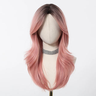 Pink ombre wig on a mannequin head with a white background