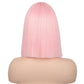 Pink wig on a mannequin head against a white background