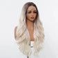 Blonde wig on a mannequin head against a white background