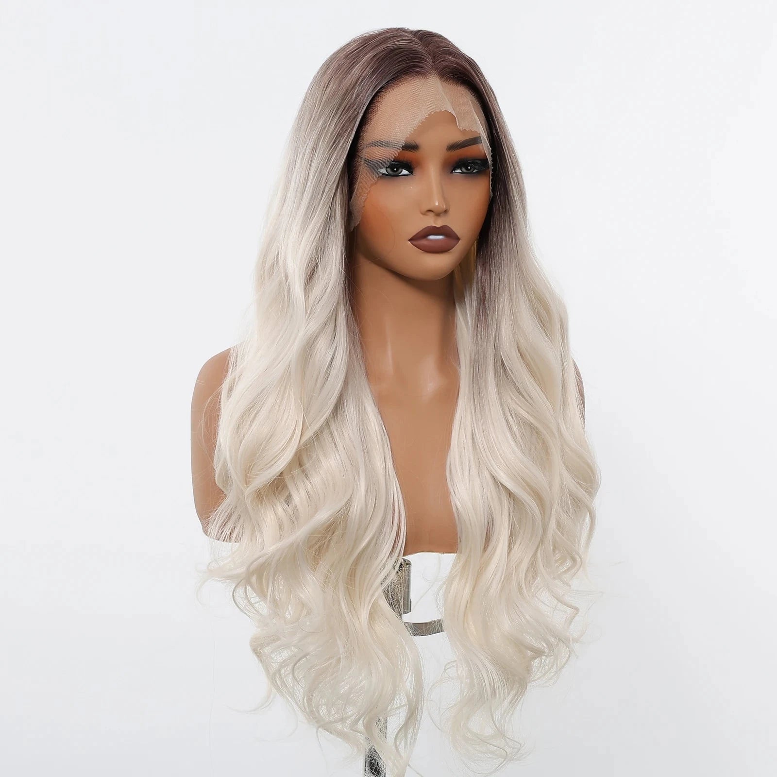Blonde wig on a mannequin head against a white background