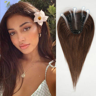 Realistic synthetic hair topper clipped into thinning hair at the part