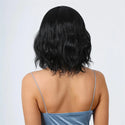 Rear view of short black wig – jaw-length bob cut