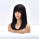 Synthetic black fringe wig – left side profile with natural texture