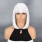 White bob wig on a mannequin head against a gray background