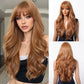 Woman wearing long auburn redhead wig with soft layers