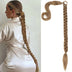 Woman with braided hair next to a blonde hair extension in a braid